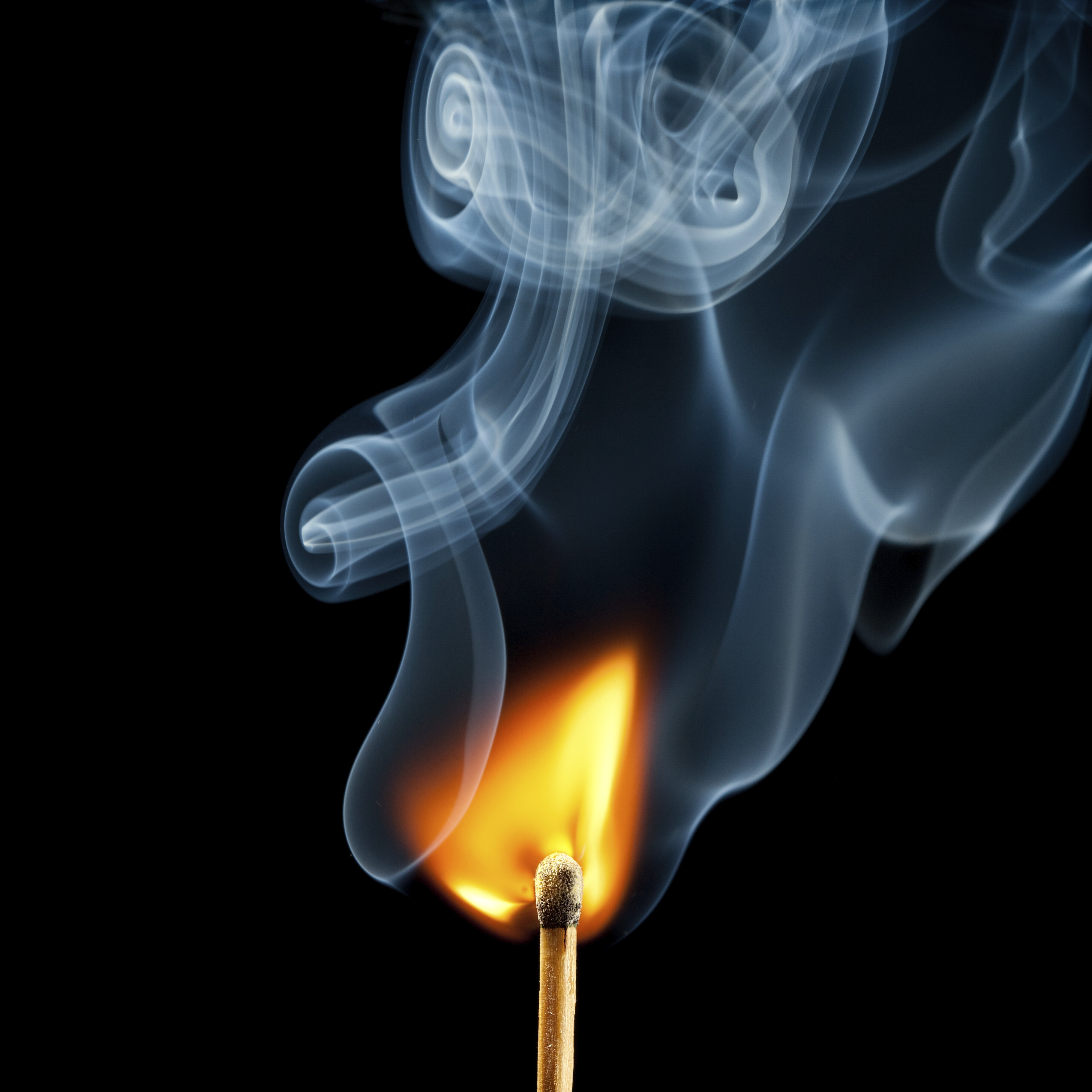 Ignition of match, with smoke on black